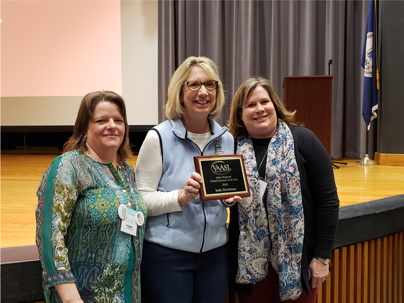 Judy Deichman receiving the VAASL James Regional Librarian of the Year Award