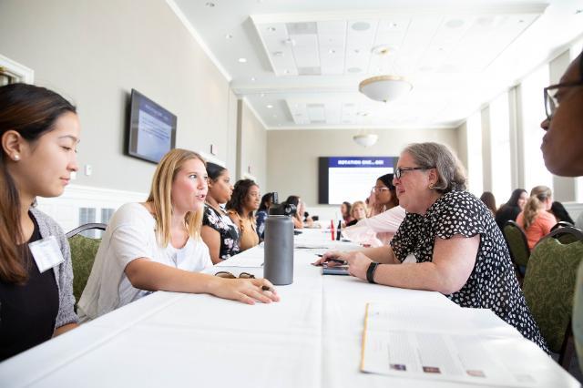 Women and Philanthropy participants talk at a workshop 2019