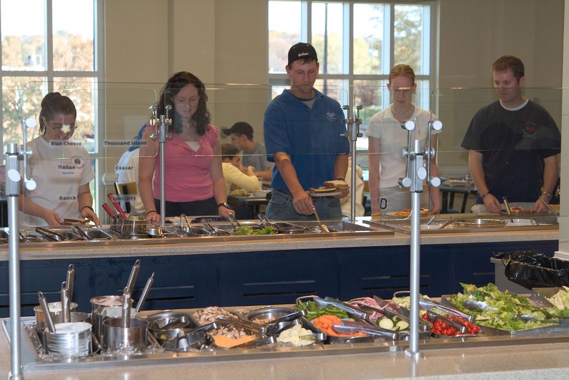 Students at the salad bar in dhall