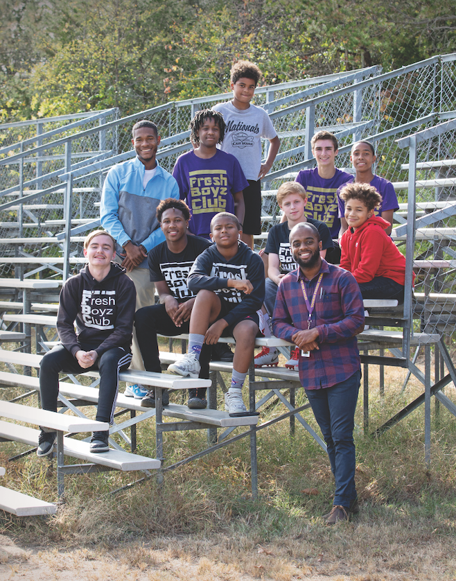 Louis Gould ’19 (standing, lower right) founded the Fresh Boyz Club, whose mission is to help young men grow into community leaders (Photo by Courtney Vogel).