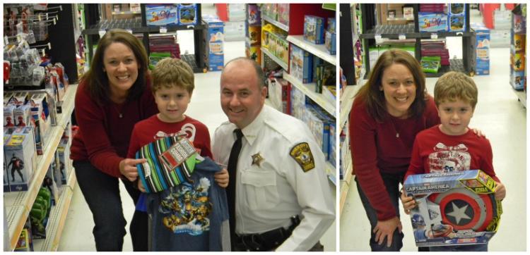 Sheriff Darrell Hodges ’07 with a mother and child he bought gifts for