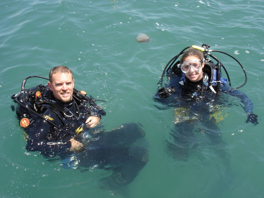 Molly Trivelpiece ’15 and Brendan Burke ’03 prepare for underwater archaeology