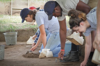 Students working at the archaeology field school