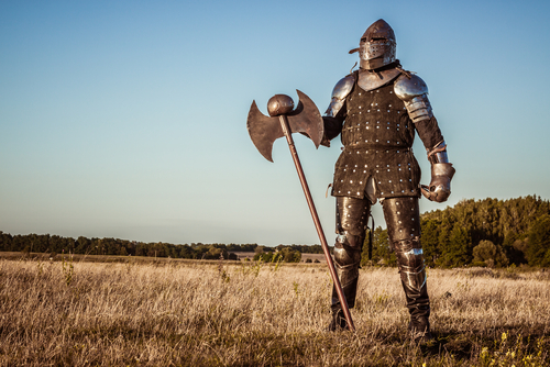 A suit of armor in a field