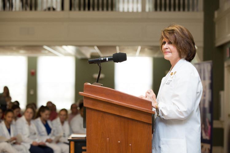 Dr. Deborah Ulmer speaking at the 2016 nursing white coat ceremony