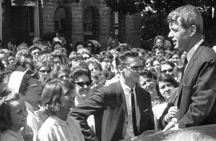 Attorney General Robert F. Kennedy stops to speak to Longwood students on High Street, 1964.