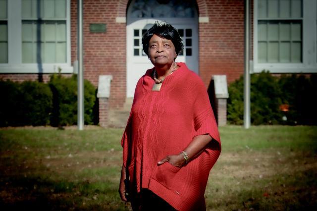 Martha Bailey Brown ’27 was about to enter eighth grade at the building behind her in this photo when Prince Edward County closed its public schools for five years in an attempt to avoid desegregation.